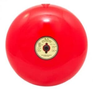 A red ball with a gold dial and a button.