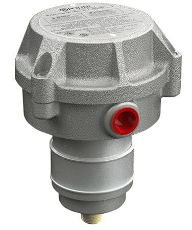 A gray and red cap is on top of the valve.