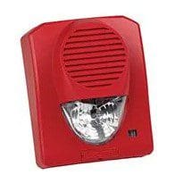 A red emergency light with a siren on it.