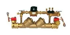 Brass water meter with dual valves.