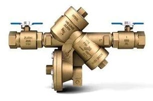 Brass plumbing valve with multiple connections.