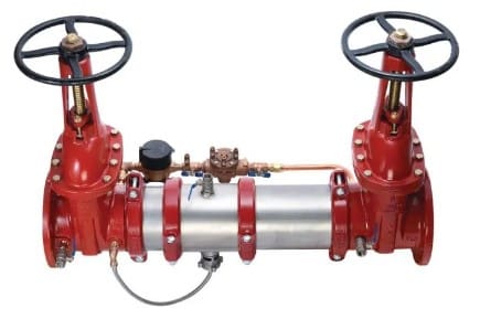 Red and silver fire sprinkler valve system.