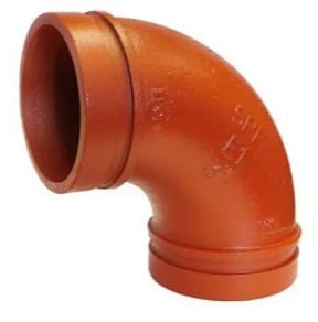 Orange 90-degree pipe fitting for plumbing.