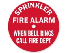 Red circle fire alarm sign with text.