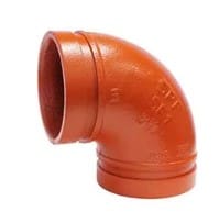 Orange 90 degree pipe fitting.