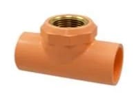 Orange PVC pipe tee with brass fitting.