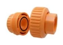 Orange plastic pipe connectors.